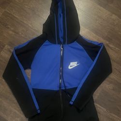 Women’s blue and black Nike zip up the front hooded jacket (SZ SM) excellent Condition(Shipping Available)