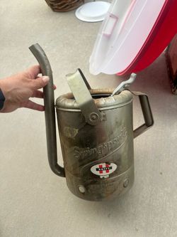 Antique oil can