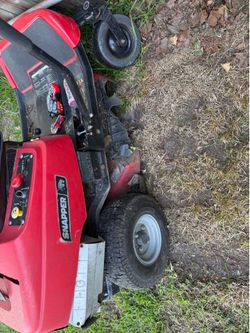 Two lawn mowers