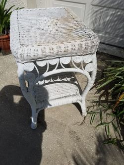 Antique white wicker table