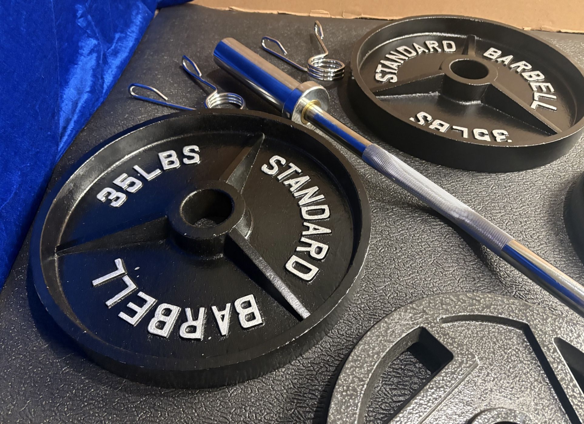 NEW Olympic Equipment Curl Bar of 20# with Cooper Bearings and Plates 2X35s, 2X25s, 2X10s and 2X5s pounds. Brute 170#