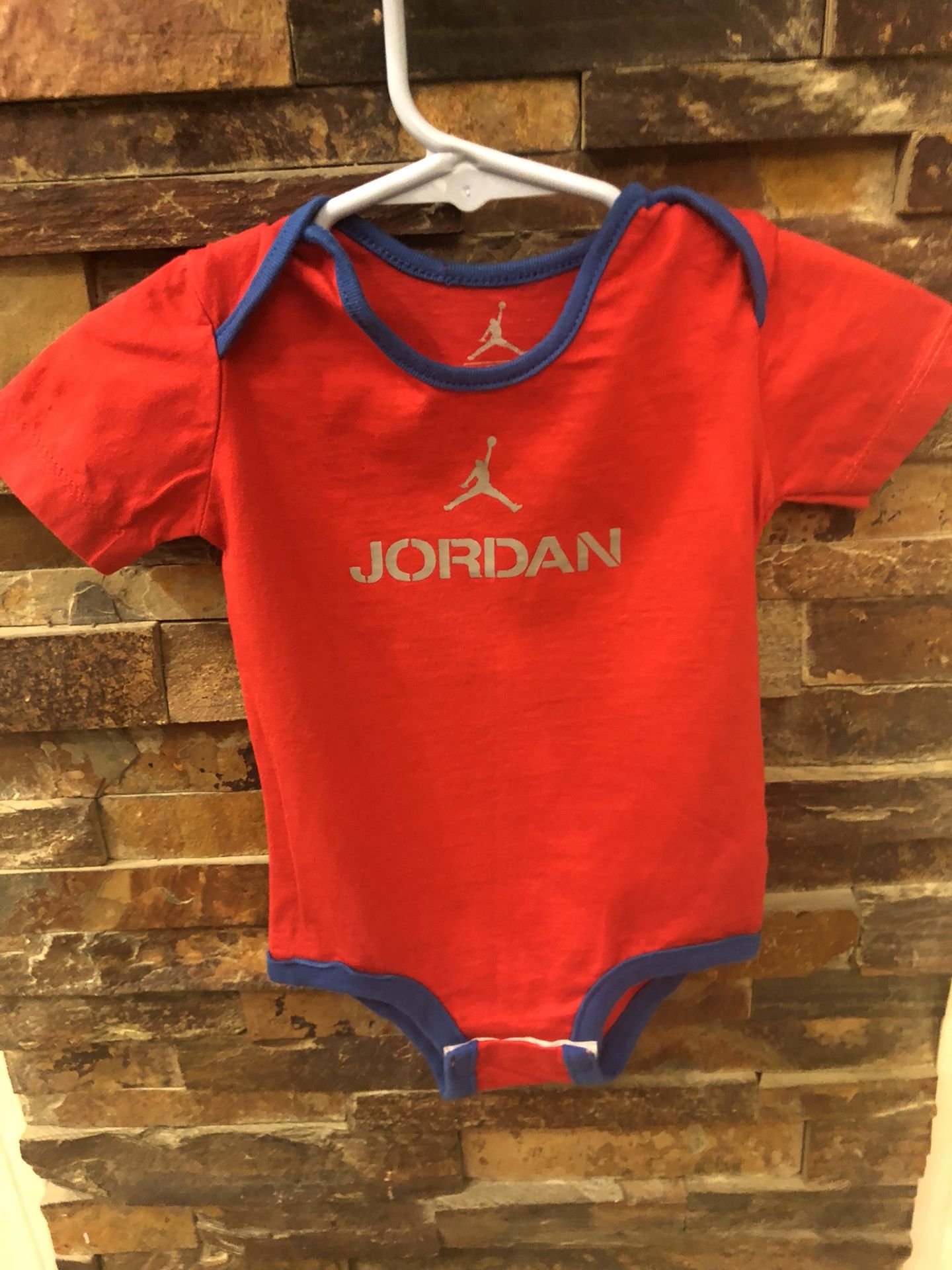 Baby Jordan onesies 9 to 12 months