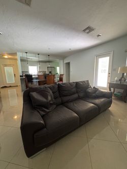 Dark brown leather couch & couch chair