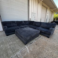 Dark Gray Sectional Couch & Ottoman