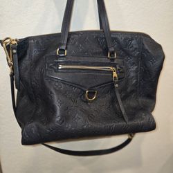 Louis Vuitton
Lumineuse leather handbag