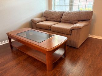 Wood and glass 52’ coffee table