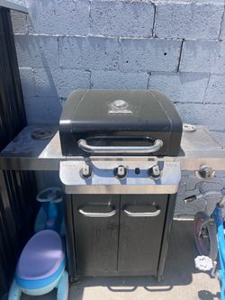a Char-Broil Signature Series 3-Burner Propane Gas Grill with a side burner