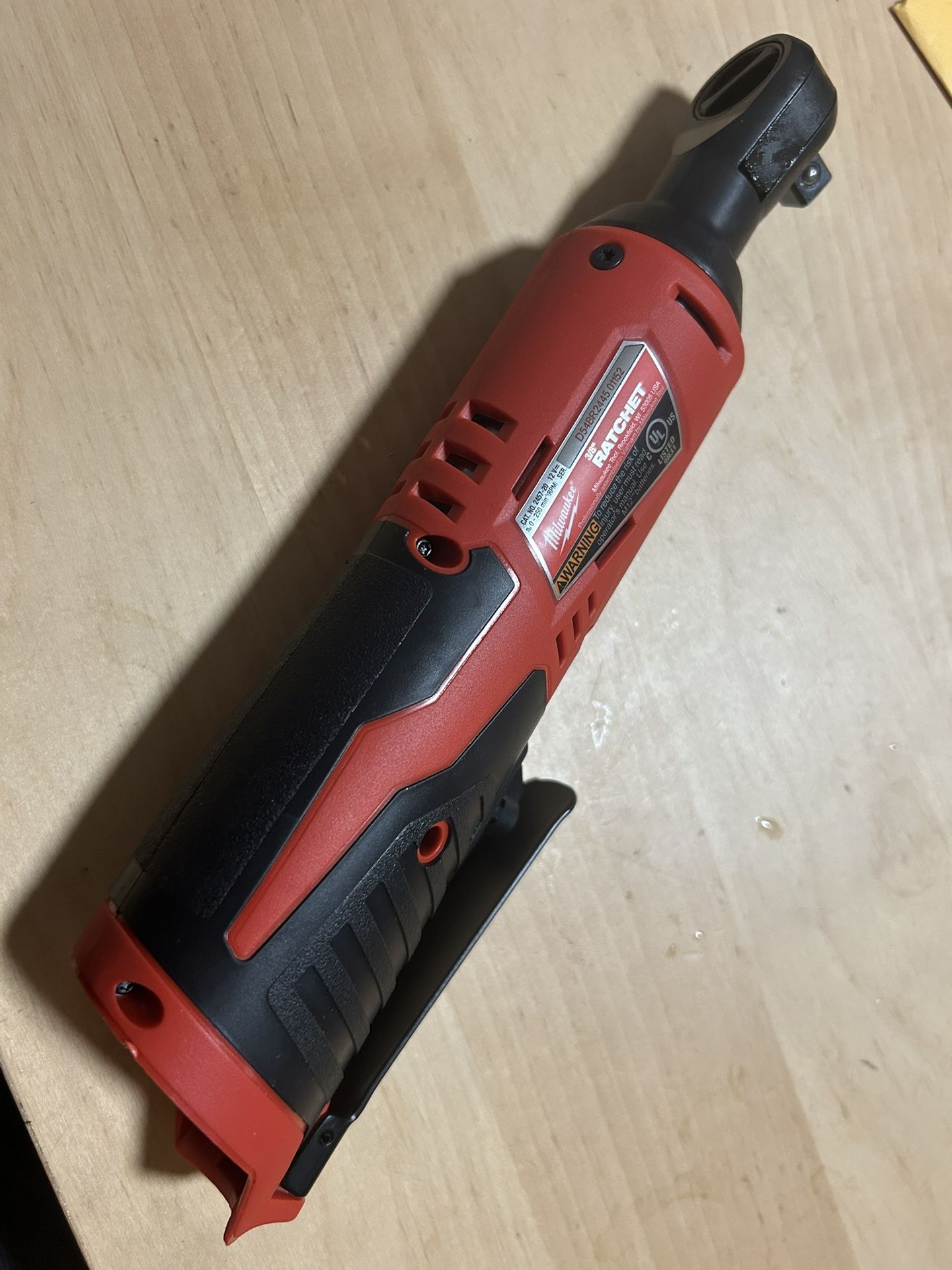 Firm! Brand new Milwaukee M12 12 volt cordless 3/8 ratchet Tool