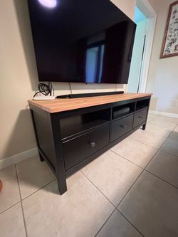 IKEA TV/Media Unit: black and light brown.