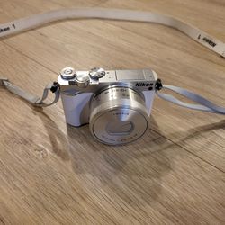 Nikon 1 J5

Camera In White