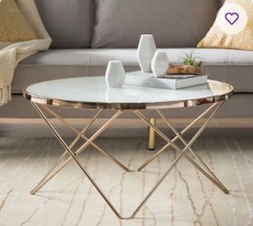 Round glass coffee table
