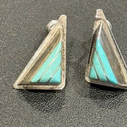 This is a striking Zuni inlaid unique teepee shaped silver earrings. These earrings are beautiful as they are each in a wonderful unique teepee shape 