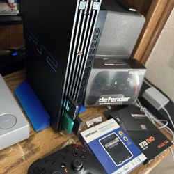 Playstation 2 with 2tb ssd and HDMI RetroGem intalled-lots of extras-hundreds of games
