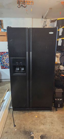 Whirlpool side by side refrigerator