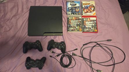 PS3 slim with games and conrollers