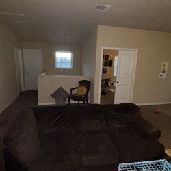 Brown three cushion couch