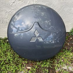 03-06 OEM Mitsubishi Spare Tire Cover