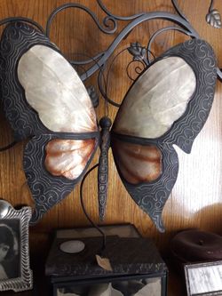 Metal butterfly with some kind of Center material