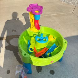 Step2 Busy Ball Play Table features a vibrant green basin and a multi-colored ball tower.