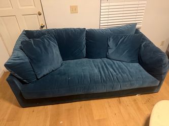 Blue velvet sofa