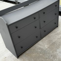 Table And A Clothing Drawer 