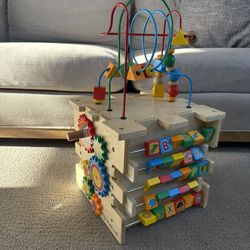 KidKraft Deluxe Activity Cube educational toy designed for toddlers.