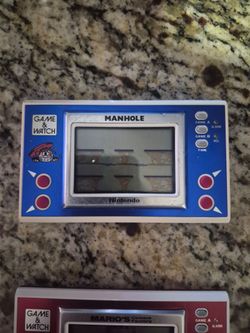 Three Vintage Nintendo Electronic Game and watch
