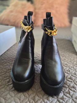 Black Leather Chelsea Boots with Gold Chain