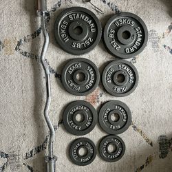 Olympic weight plates and barbell