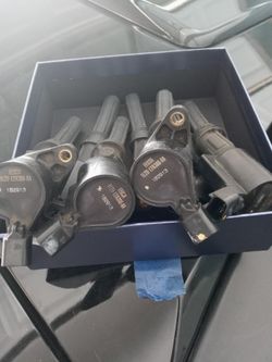 EE03A MOTORCRAFT COIL ASSEMBLY IGNITION. SPARK PLUG. WIRE 