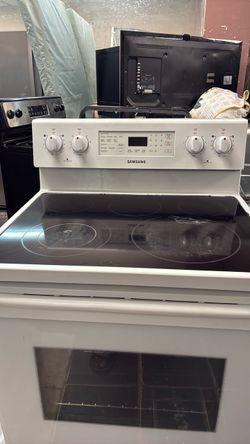 White Samsung glass top stove