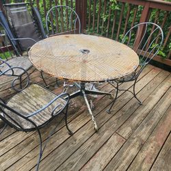 Vintage Wrought Iron Patio Set With Four Chairs Table And Four Chairs Very Heavy Gray And Black Design