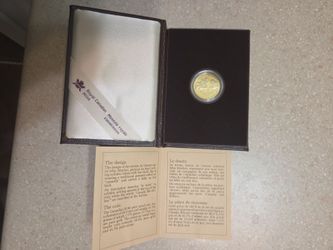 1990 Canada 1/4 oz proof gold coin. Comes with original box and COA