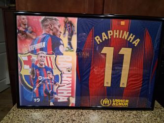 RAPHINHA OF THE BARCELONA SOCCER TEAM. BRANDED,AUTHENTIC FRAMED JERSEY.