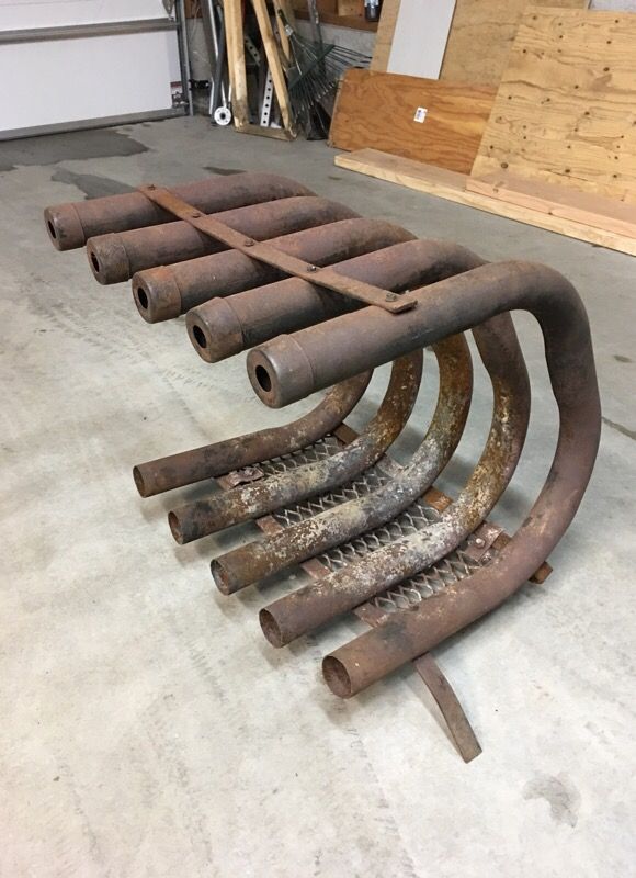 Fireplace grate/heat exchanger