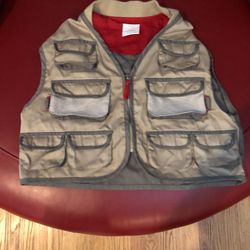 Child’s explorer vest, lots of pockets to carry their toys