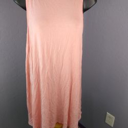 Peach colored long hanging blouse size medium
96% rayon and 4% spandex

