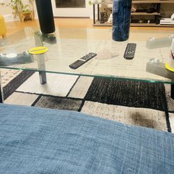 Modern Glass Coffee Table with Black Metal Legs – Excellent Condition