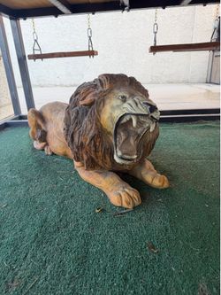 Terracotta glazed lion sculpture