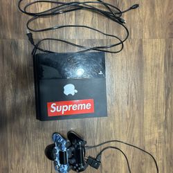 PS4 + 2 Controllers + Charging Stand