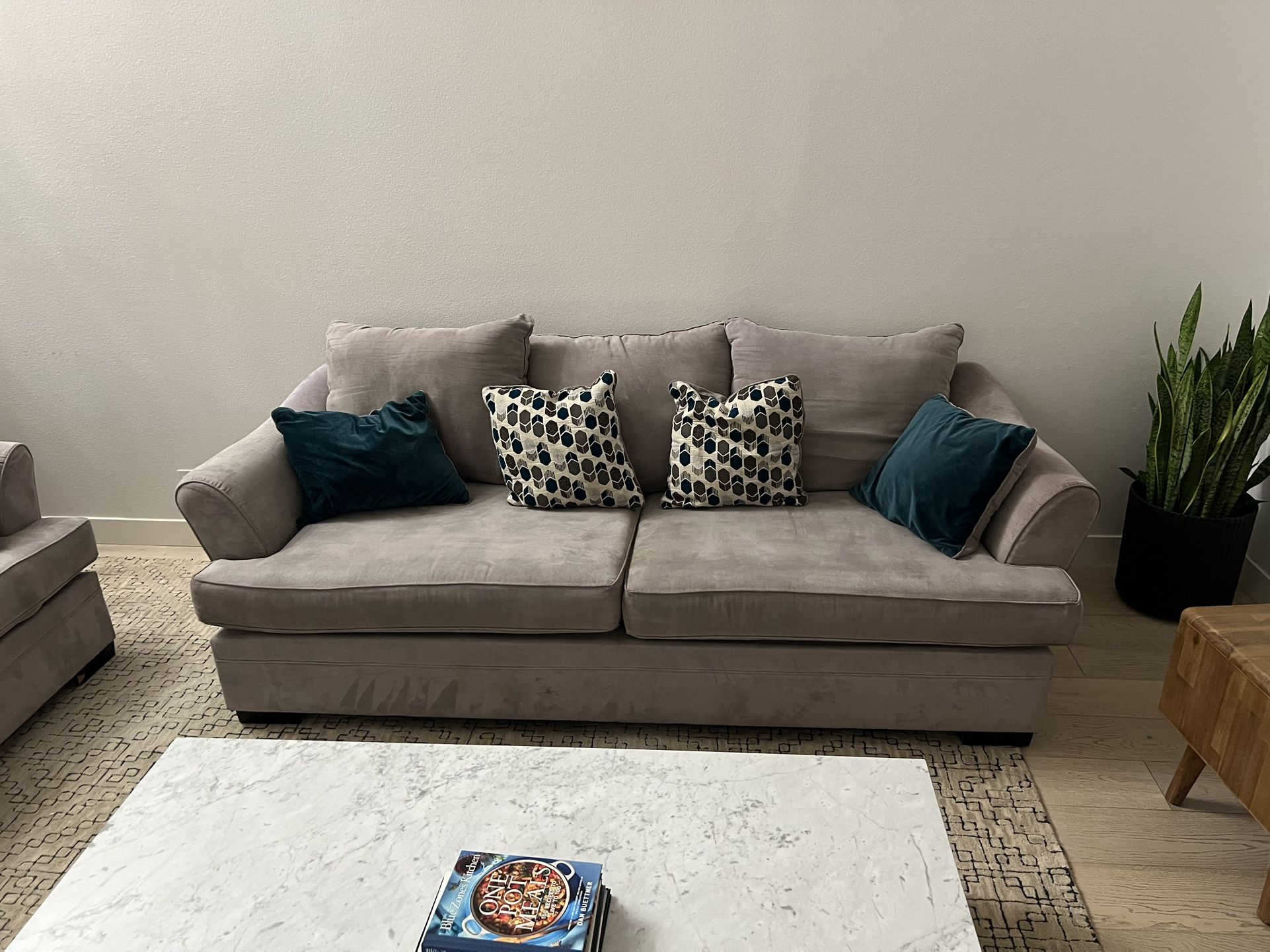 Used Living Spaces Grey Couch And Love Seat