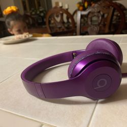 Purple beats solo with wire