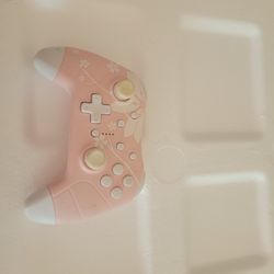 Mytrix Wireless Switch Pro Controller in Sakura Pink.