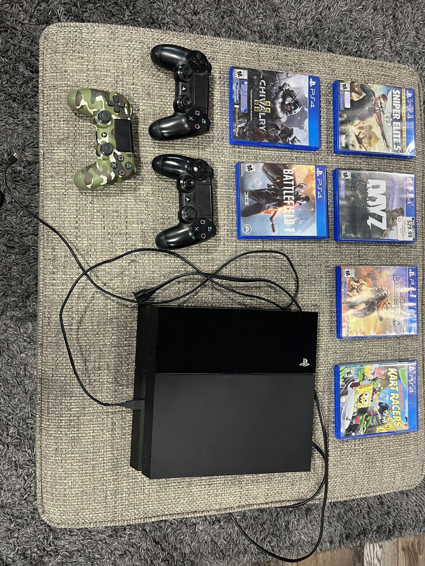 PS4 With 6 Games And 3 Sony Controllers