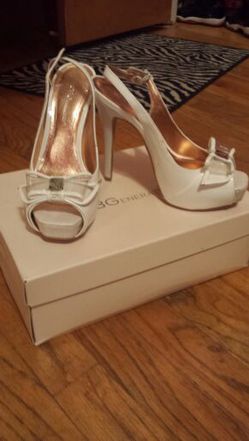Authentic BCBG white heels. Size 6