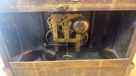 An antique Sessions black mantel clock