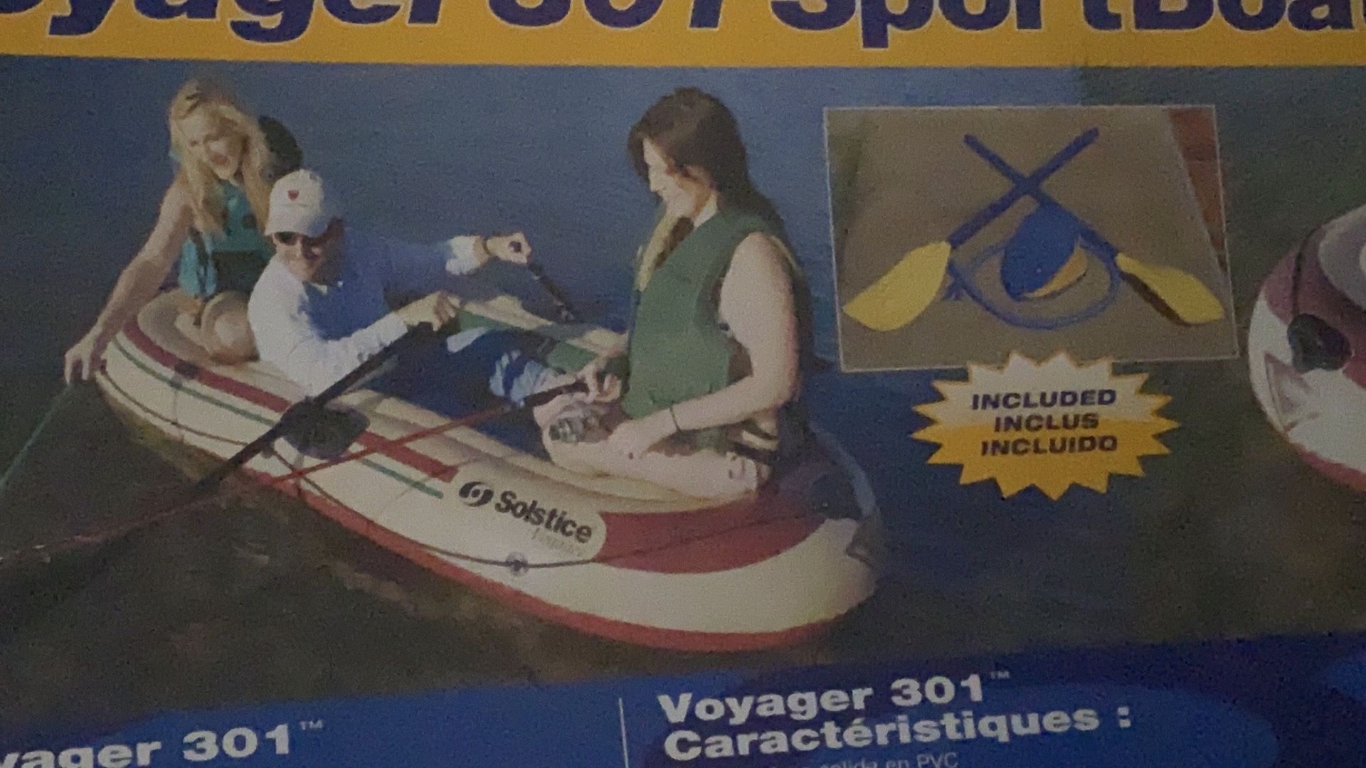 Three people inflatable boat