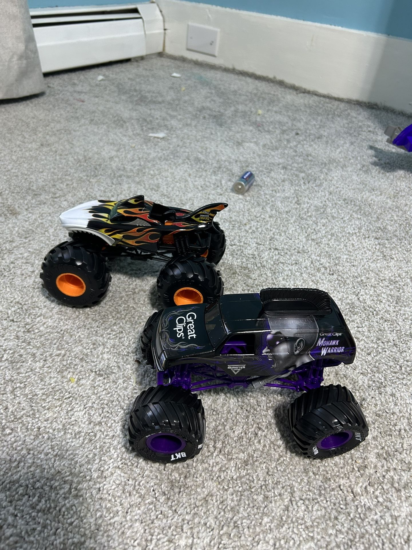 Two 1:24 Scale Monster Jam Hotwheels Trucks 