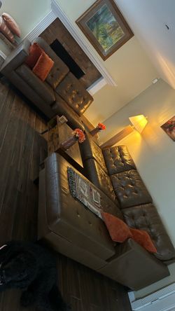 Large Brown Tufted Sectional Couch With Ottoman