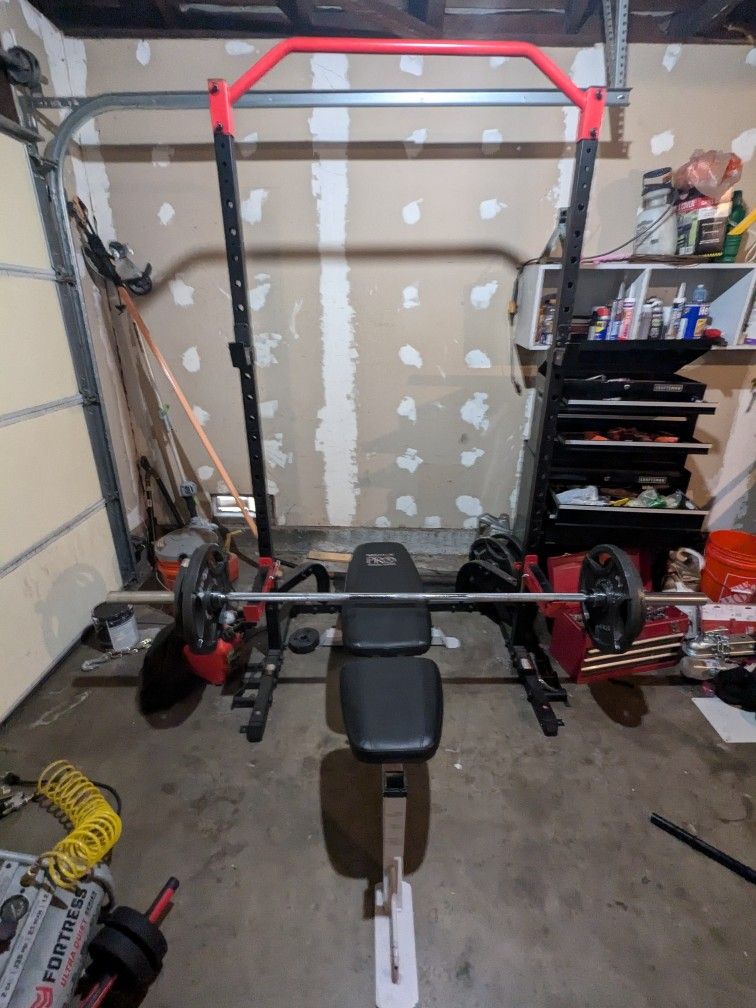 Half Rack W/ Weights Bench And Barbell